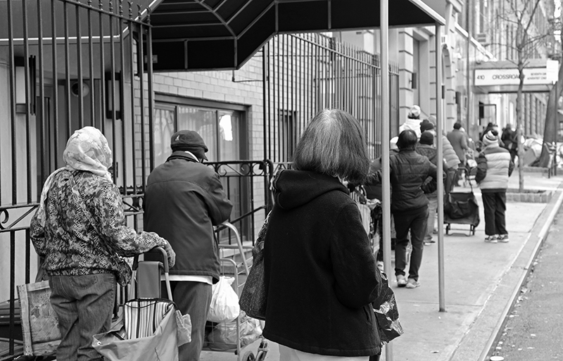 2020 : Food Lines : Seventh Day Adventists Help the Needy : Streetlife : New York City : Times Square : Richard Moore : Photographer : Photojournalist